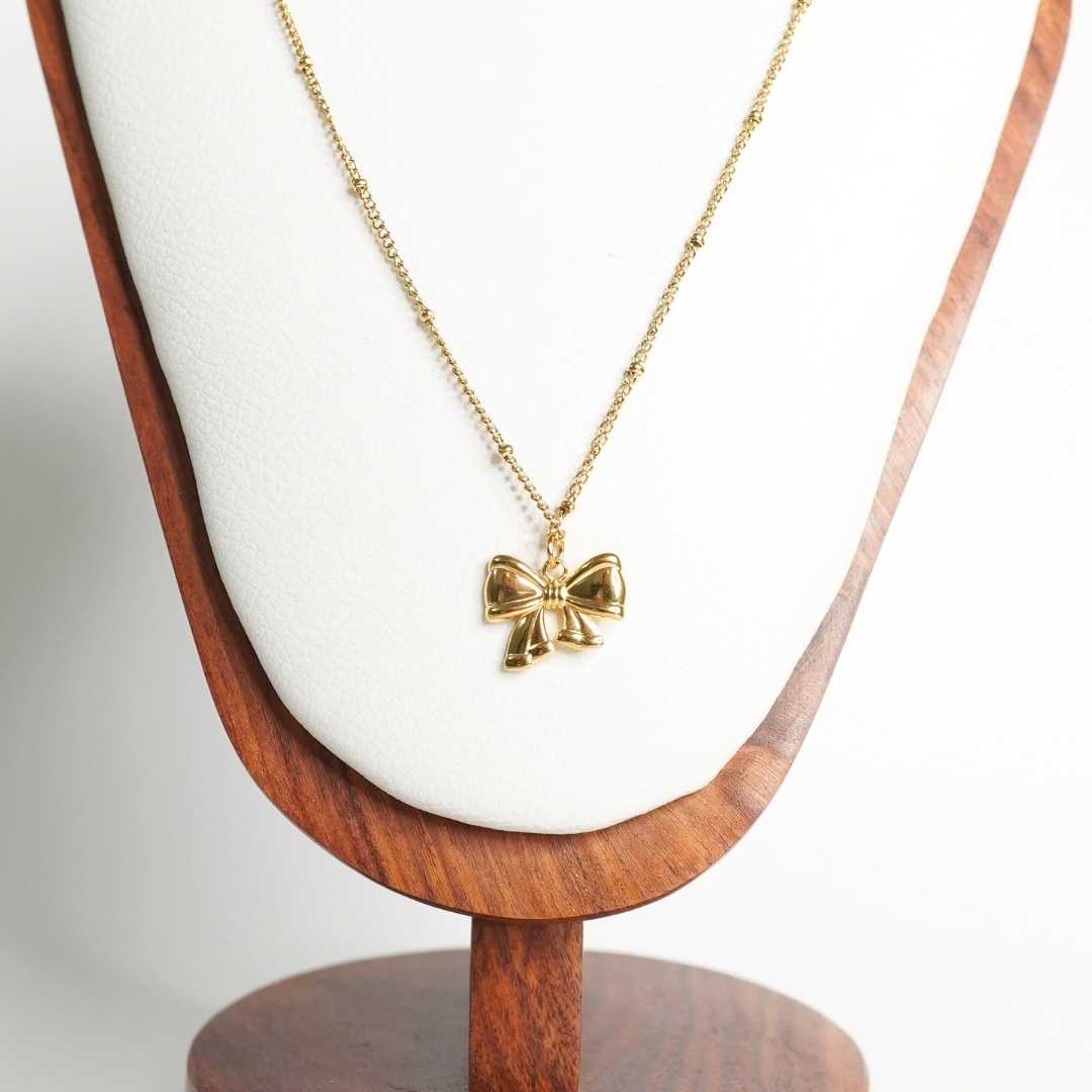 Golden Flutter Bow Pendant Necklace