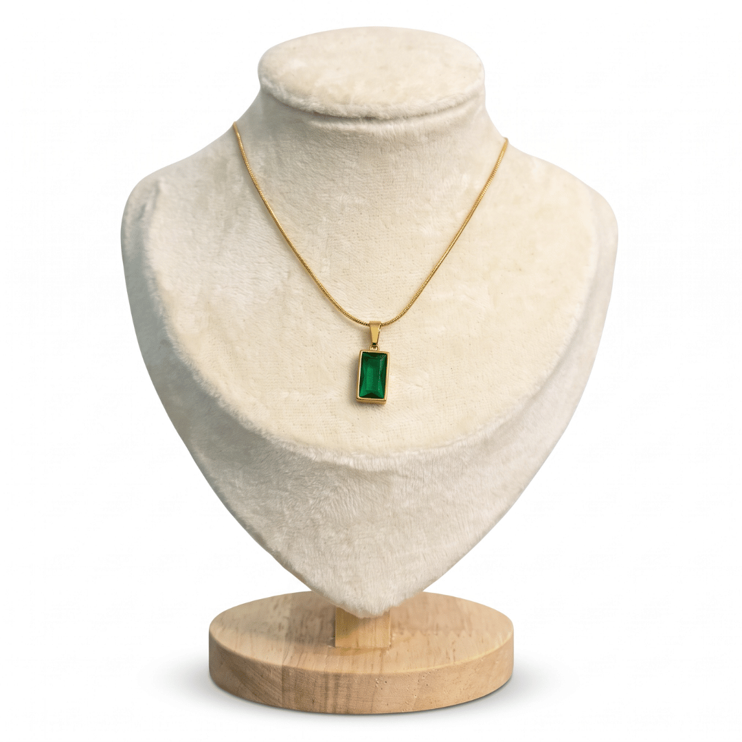 Close-up of anti-tarnish 18K gold-plated stainless steel emerald green baguette pendant necklace