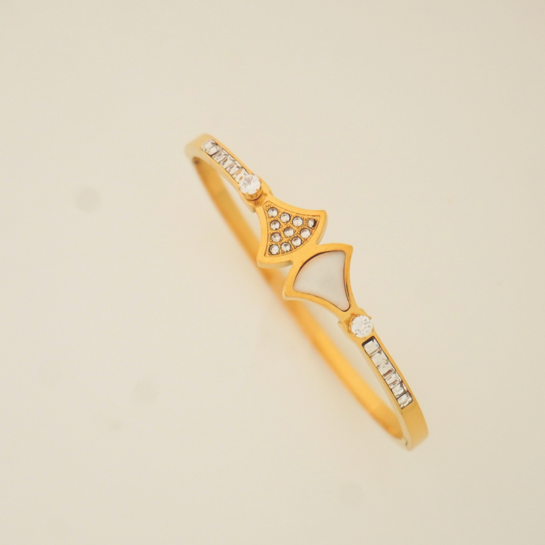 Gold angular designer bracelet with illusion-cut stones and anti-tarnish finish – Ashara Jewels”
