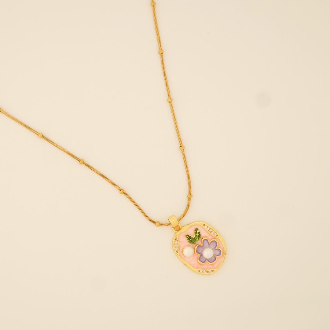 18K gold plated floral pendant necklace with pink and lavender enamel and beaded chain from Ashara Jewels

