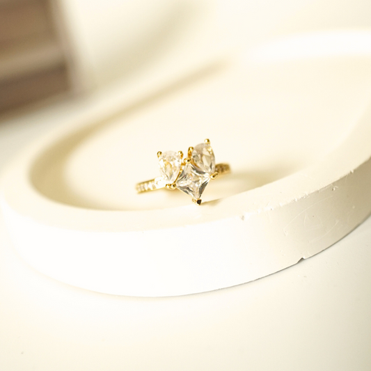18K gold-plated open ring featuring two pear-cut and one heart-cut cubic zirconia stones — anti-tarnish, adjustable cocktail ring for women.”
