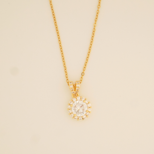 18K gold-plated round solitaire pendant necklace with halo-style cubic zirconia stones on a classic chain from Ashara Jewels.