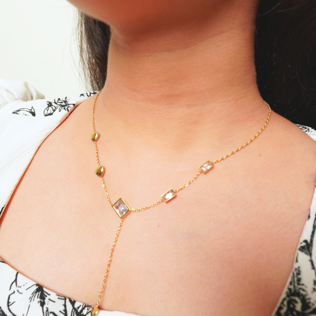 18K gold-plated Y-necklace with bezel-set square crystals and golden nugget accents — minimalist, anti-tarnish jewelry for layering and statement looks.