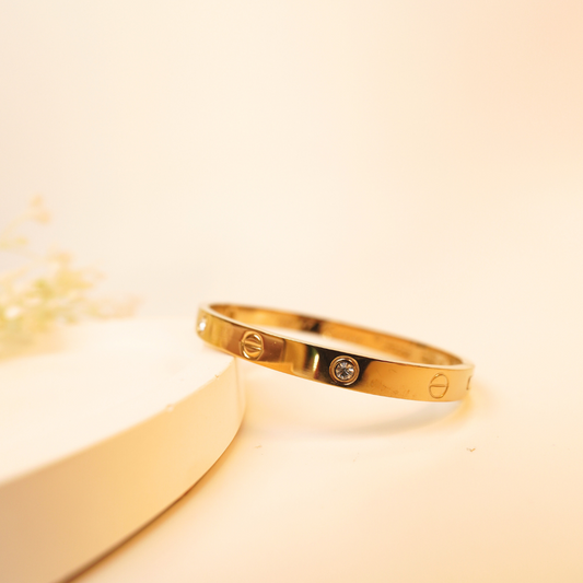 Emblem Bangle – Gold-Plated Screw Motif Designer Bracelet