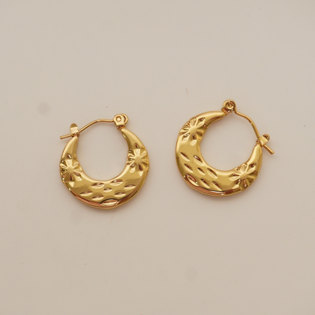 18K gold-plated crescent hoop earrings with floral embossed texture – Ashara Jewels vintage-style waterproof jewelry