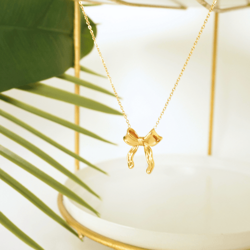 Ashara Satin Muse Bow Necklace – 18K gold-plated stainless steel necklace