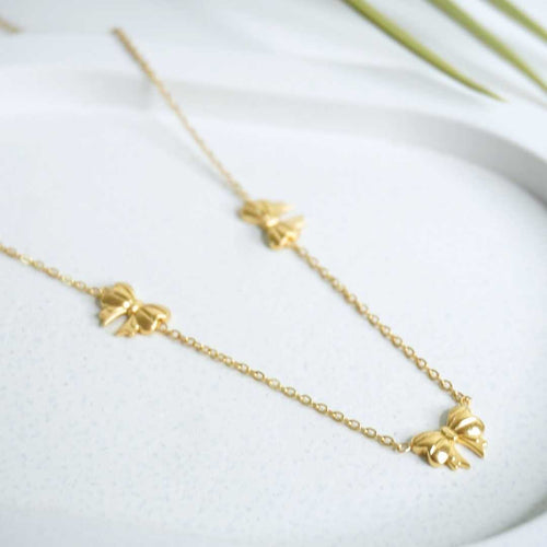 Triple Bow Charm Necklace – 18K gold-plated stainless steel necklace