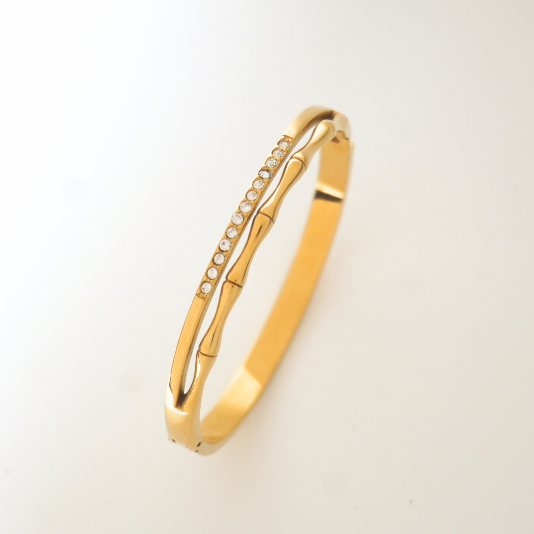 Branch & Bling Bangle – 18K gold-plated bangle with crystal detailing and branch-style design, fits size 2.4–2.8