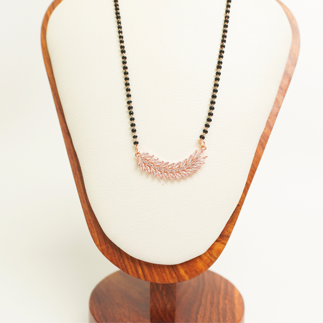 Feather leaf rose gold mangalsutra with CZ detailing and black bead chain, anti-tarnish stainless steel
