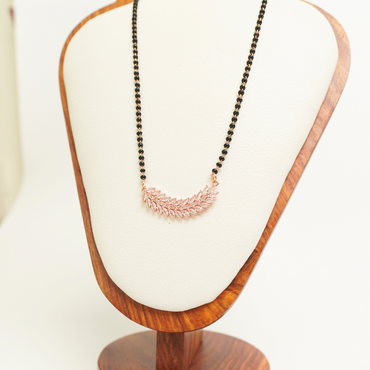 Feather leaf rose gold mangalsutra with CZ detailing and black bead chain, anti-tarnish stainless steel
