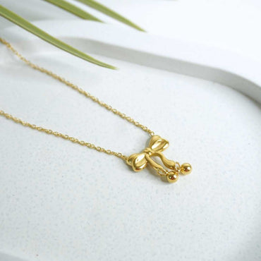 Golden Bow Pendant Necklace