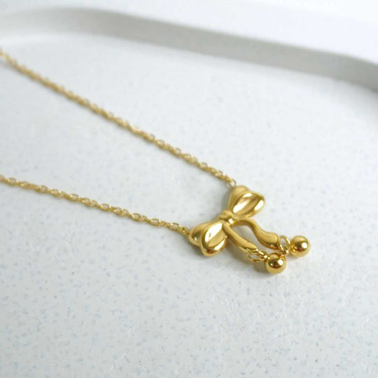 Golden Bow Pendant Necklace