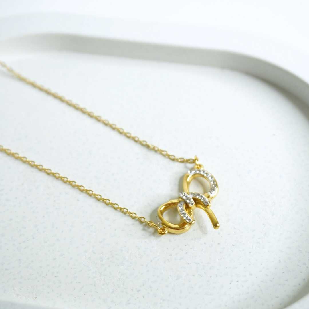 Golden Crystal Bow Necklace
