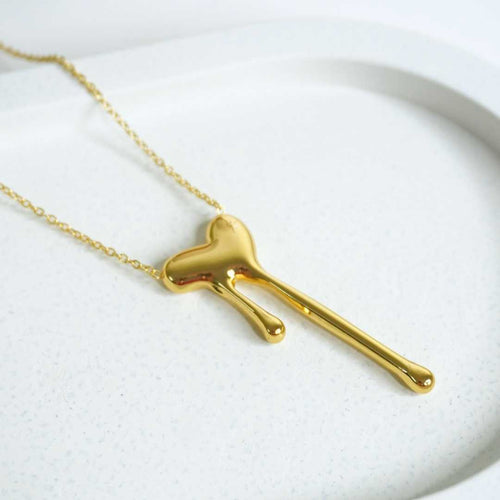 Bold Bone Pendant Necklace – 18K gold-plated stainless steel pendant necklace