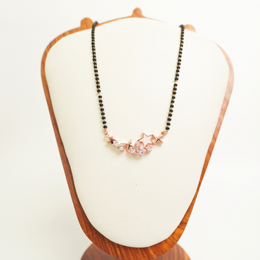 Star design rose gold mangalsutra with CZ stones on black bead chain, anti-tarnish stainless steel
