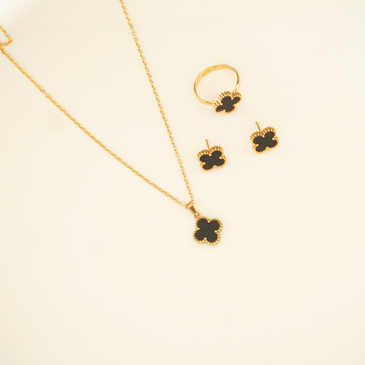 18K gold-plated black enamel clover charm necklace, earrings, and ring set from Ashara Jewels