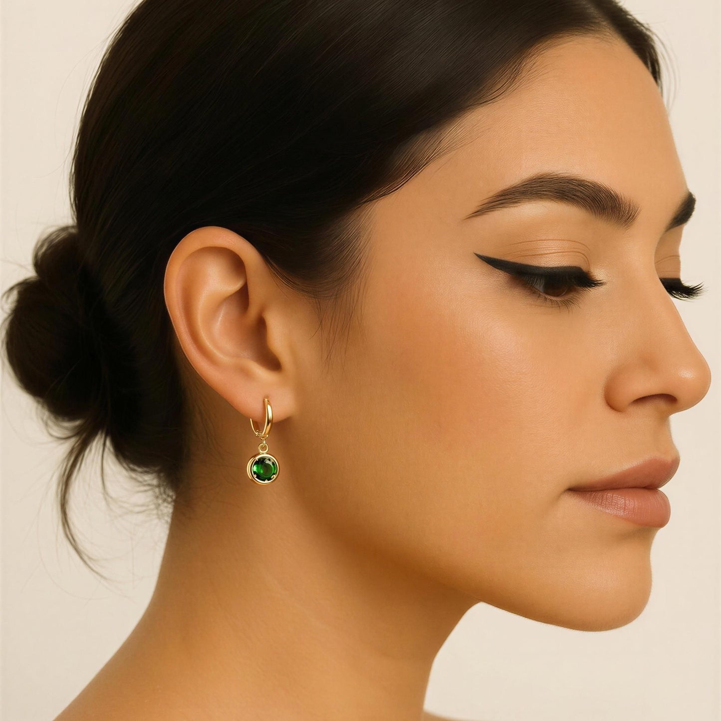 Emerald Aura Drop Huggie Earrings